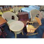 A PAIR OF WICKER CHAIRS, TABLE, CHILDS CHAIR, COFFEE TABLE , SMALL CABINET AND ROCKING CHAIR.(8)