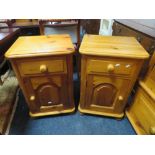 A PAIR OF PINE BEDSIDE CABINETS H 70 CM W 45 CM (2)