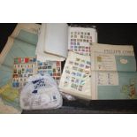 A QUANTITY OF STAMPS, BOTH LOOSE AND IN ALBUMS TOGETHER WITH WALL MAPS