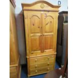 A HONEY PINE DOUBLE WARDROBE WITH 3 DRAWERS BELOW H 213 CM W 99 CM