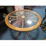 A RETRO SHIPS WHEEL GLASS COFFEE TABLE DIA. 76CM