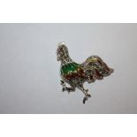 A STERLING SILVER PLIQUE DE JOUR BROOCH IN THE FORM OF A COCKEREL