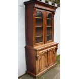 A VICTORIAN MAHOGANY GLAZED FLOORSTANDING BOOKCASE, the twin glazed door upper section with