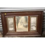 A VINTAGE MAHOGANY FRAMED MIRROR FLANKED BY BLACK AND WHITE PRINTS - OVERALL SIZE - 96CM X 63CM