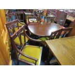 A SET OF EIGHT SOLID MAHOGANY SHERATON STYLE DINING CHAIRS WITH A MODERN TABLE
