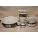 A FIVE PIECE CERAMIC JUG AND BOWL SET