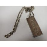 A HALLMARKED SILVER INGOT ON CHAIN