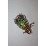 A STERLING SILVER PLIQUE DE JOUR BROOCH IN THE FORM OF AN OWL ON A BRANCH