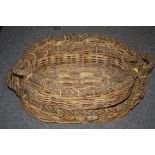 TWO WICKER ROPE HANDLED OVAL LOG BASKETS, LARGEST WIDTH, 66 CM