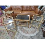 A CANE OCCASIONAL GLASS TOP TABLE, 2 SIMILAR BEDSIDE TABLES AND A RETRO STOOL (4)