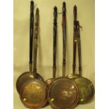 A COLLECTION OF SIX COPPER AND BRASS WARMING PANS