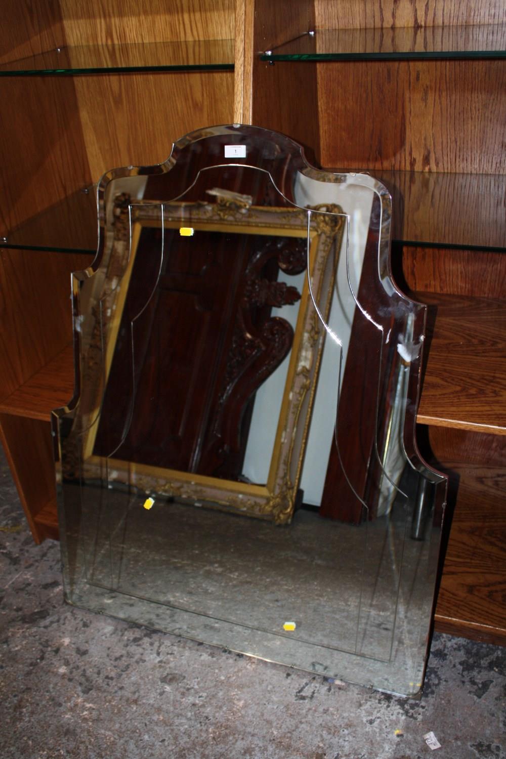 A LARGE SHAPED BEVEL EDGED OVERMANTEL MIRROR SIZE - 114CM X 90CM