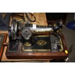 A VINTAGE SINGER SEWING MACHINE