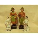 A PAIR OF STAFFORDSHIRE STYLE FIGURES OF SIR JOHN FRANKLIN AND LADY FRANKLIN TOGETHER WITH A PAIR OF