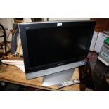 A PANASONIC 26" VIERA FLATSCREEN TV WITH REMOTE