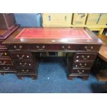 A REPRODUCTION MAHOGANY LEATHER TOPPED TWIN PEDESTAL DESK H 73 CM W 121 CM