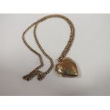 A LARGE 9CT GOLD BACK & FRONT LOCKET ON CHAIN