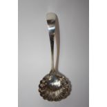 A HALLMARKED SILVER SIFTER SPOON