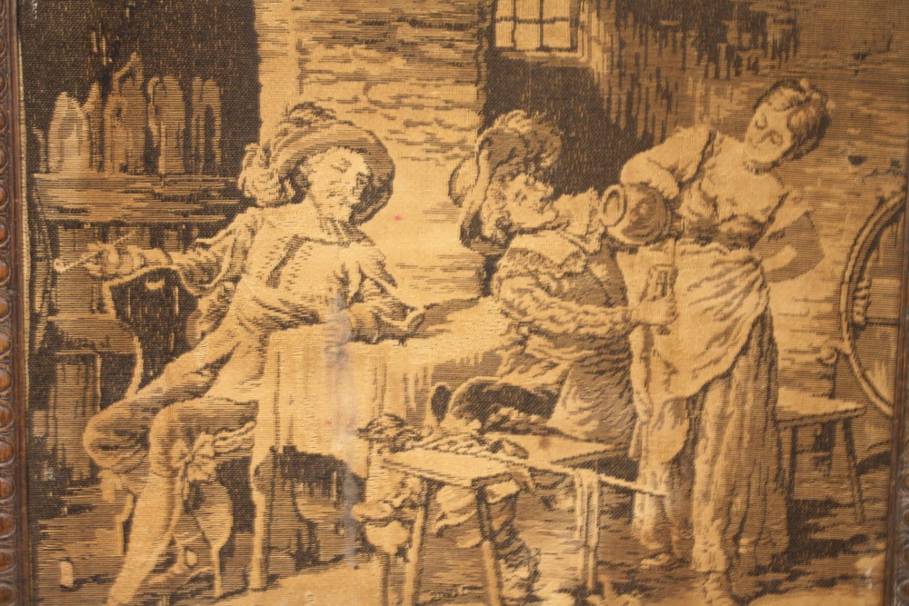 AN ANTIQUE TAPESTRY/ NEEDLEWORK PANEL DEPICTING AN INTERIOR SCENE WITH FIGURES IN OAK BARLEY TWIST - Image 2 of 3