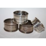 FOUR HALLMARKED SILVER NAPKIN RINGS