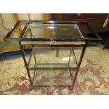 AN ART DECO STYLE GLASS AND METAL DRINKS TROLLEY W-70 CM