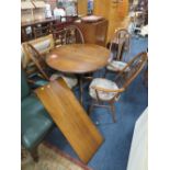 AN ERCOL EXTENDING TABLE WITH FOUR SWAN BACK CHAIRS ( 3+1 )