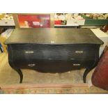 A MODERN FAUX LEATHER BOMBE SHAPED TWO DRAWER CHEST H-84 W-122 CM