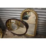 A GILT FRAMED ARCHED WALL MIRROR, OVERALL HEIGHT INCLUDING FRAME 86 CM, TOGETHER WITH A MAHOGANY