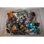 A BOX OF COSTUME JEWELLERY