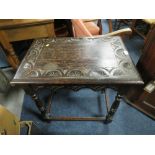 AN ANTIQUE CARVED OAK SIDE TABLE H-69 CM W-66 CM