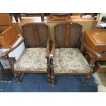 A PAIR OF BERGERE WALNUT ARMCHAIRS CIRCA. 1930 (2)