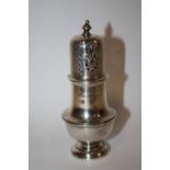 A HALLMARKED SILVER SUGAR CASTER WITH WEIGHTED BASE