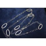 A LONG LENGTH MODERN SILVER CHAIN - APPROX 23.6G