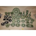 A QUANTITY OF GREEN AND BLACK WEDGWOOD JASPERWARE, TO INCLUDE VASES, PIN DISHES ETC.