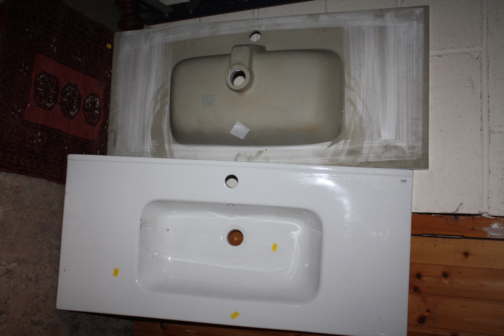 TWO RAK CERAMICS SINKS 102 CM X 46 CM AND A SHOWER BASE