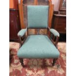 AN EDWARDIAN MAHOGANY ARMCHAIR