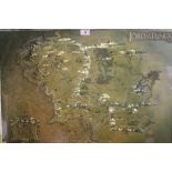 A FRAMED AND GLAZED LORD OF RINGS MAP OF MIDDLE EARTH TOGETHER WITH A PRINT