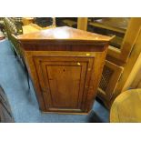 AN ANTIQUE OAK / MAHOGANY HANGING CORNER CUPBOARD