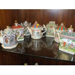 A COLLECTION OF SEVEN NOVELTY SADLER TEAPOTS