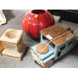 A CHILD'S PULL ALONG TOY CAR TOGETHER WITH A MODERN VASE AND A CANDLE STAND