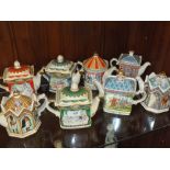 A COLLECTION OF EIGHT NOVELTY SADLER TEAPOTS