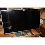 A PANASONIC 42" FLATSCREEN TV WITH REMOTE - HOUSE CLEARANCE