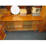 A RETRO LIGHT OAK GLAZED BOOKCASE WITH LATER TOP W-158 CM