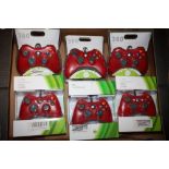 A TRAY OF BOXED GAMING CONTROLLERS