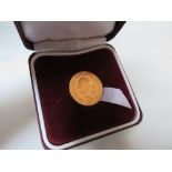 A QUEEN ELIZABETH II GOLD SOVEREIGN DATED 2018