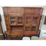 A LARGE 'OLD CHARM' LEADED AND GLAZED OAK LINENFOLD WALL DISPLAY CABINET WITH CORNER AND TOP BOXES H