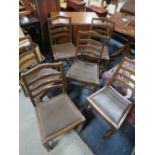 AN OAK BARLEY TWIST DINING TABLE AND SIX CHAIRS