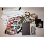 A BAG OF ASSORTED COSTUME JEWELLERY