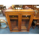 A VICTORIAN MAHOGANY GLAZED TWO DOOR BOOKCASE W-103 CM