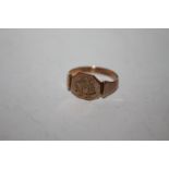 A HALLMARKED SILVER 9 CT GOLD SIGNET RING